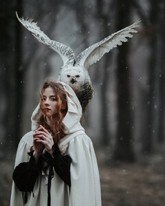 Working with snow owl was a dream coming true   It was pretty cold and I always try to do it as faster as possible. I did a this shoot with 135 mm f 2.0 lens, my favorite when it comes to portraits. Model was  (1).jpg