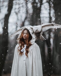Working with snow owl was a dream coming true   It was pretty cold and I always try to do it as faster as possible. I did a this shoot with 135 mm f 2.0 lens, my favorite when it comes to portraits. Model was  (2).jpg