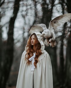 Working with snow owl was a dream coming true   It was pretty cold and I always try to do it as faster as possible. I did a this shoot with 135 mm f 2.0 lens, my favorite when it comes to portraits. Model was  (6).jpg