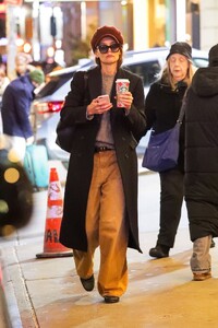 katie-holmes-exudes-effortless-style-in-newsboy-cap-during-nyc-coffee-run-12.20.2024-2.jpg
