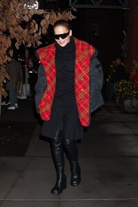 rita-ora-dazzles-in-nyc-with-a-chic-black-coat-and-boots-set-to-co-host-nye-with-ryan-seacrest.-0.jpg