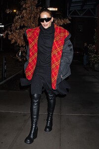 rita-ora-dazzles-in-nyc-with-a-chic-black-coat-and-boots-set-to-co-host-nye-with-ryan-seacrest.-1.jpg