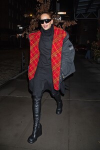 rita-ora-dazzles-in-nyc-with-a-chic-black-coat-and-boots-set-to-co-host-nye-with-ryan-seacrest.-3.jpg
