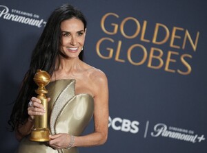 demi-moore-wins-best-actress-at-golden-globes-2025-7.jpg