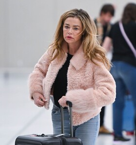 denise-richards-flaunts-smiles-at-jfk-10-17-2024-5.jpg
