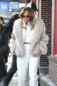 jennifer-lopez-stuns-in-hermes-white-and-ysl-fur-at-sundance-spider-woman-premiere-1.jpg
