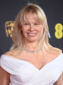 pamela-anderson-s-elegant-bafta-look-in-jacquemus-1.jpg
