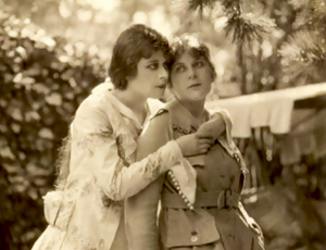 Theda with sister.png