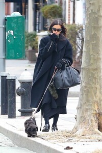 irina-shayk-pairs-black-outfit-with-puppy-02.20.2025-2.jpg