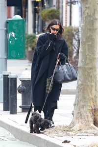 irina-shayk-pairs-black-outfit-with-puppy-02.20.2025-3.jpg