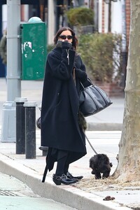 irina-shayk-pairs-black-outfit-with-puppy-02.20.2025-4.jpg