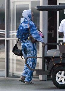 rihanna-and-a-ap-rocky-return-from-caribbean-vacation-02.26.2025-7.jpg