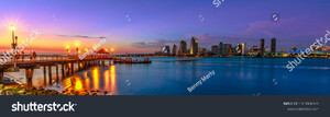 stock-photo-panorama-of-coronado-old-pier-reflecting-on-in-san-diego-bay-from-coronado-island-california-usa-1303806565.jpg