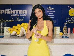 kylie-jenner-brings-bold-yellow-latex-to-revolve-pool-party-0.jpg