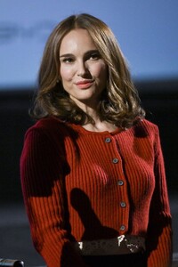natalie-portman-in-red-cardigan-and-lace-trim-skirt-at-lumiere-film-festival-2025-1.jpg