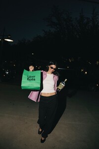 kendall-jenner-in-pink-jacket-and-crop-top-at-818-tailgate-event-dallas-2025-7.jpg