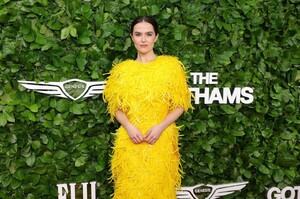 zoey-deutch-at-gotham-awards-2025-in-yellow-feathered-prada-gown-0.jpg