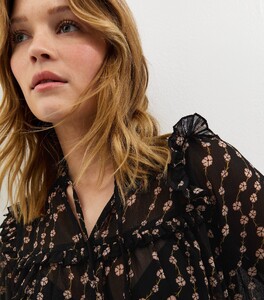 black-semi-sheer-floral-print-ruffle-bib-blouse (1).jpg
