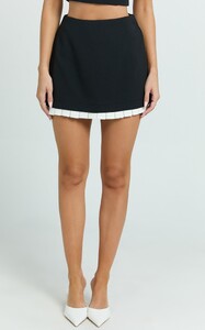 EVenz - Showpo - Makenzie_Mini_Skirt_-_Contrast_Pleat_Hem_Straight_Skirt_in_Black__04.jpg