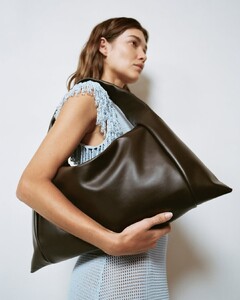 FLO in Coffee. Softly sculpted. Spacious yet composed..jpg