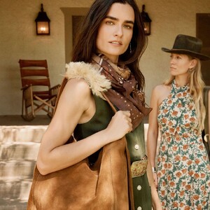 When the weather calls for a pop of fur. Meet our signature slouch hobo - The W Bag with a detac (1).jpg