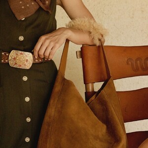 When the weather calls for a pop of fur. Meet our signature slouch hobo - The W Bag with a detac (4).jpg